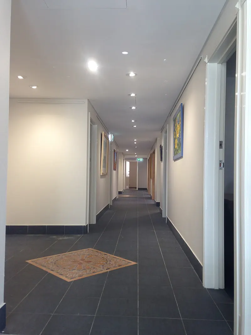 Long corridor lit with LED downlights