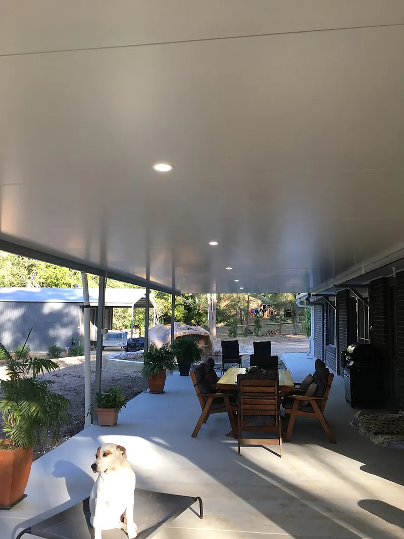Covered patio with LED downlights and outdoor furniture